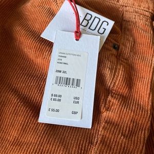 Urban outfitters orange corduroy flare pants